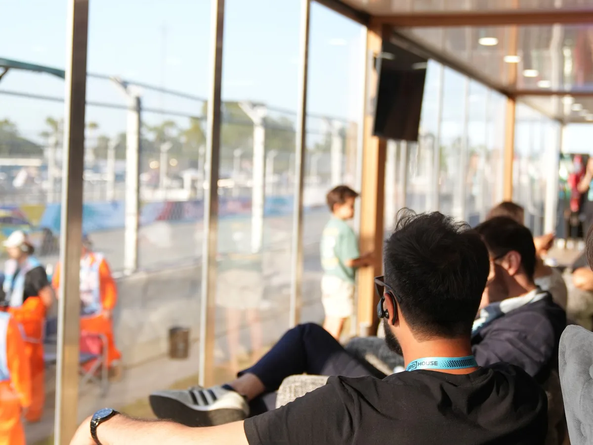 Guests inside the GRID House suite watching the circuit