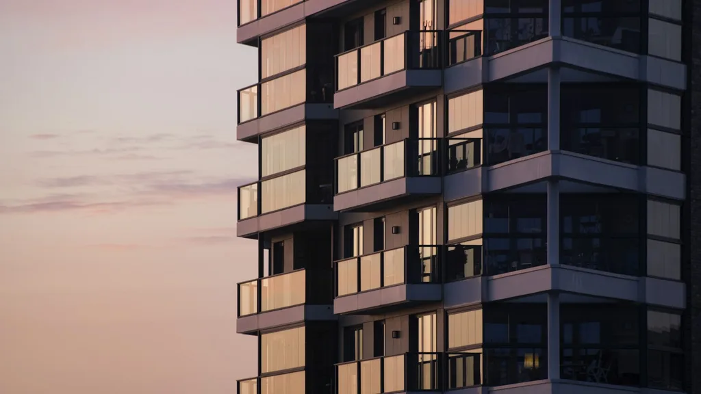 Facade of a modern residential tower at dusk